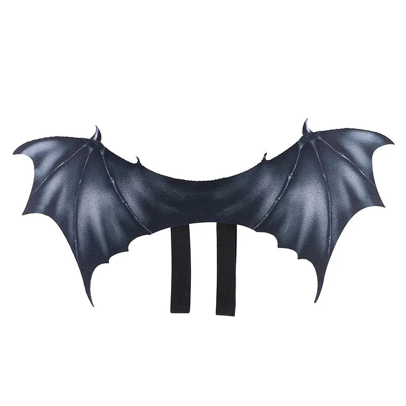Black cloth bat wings for pets in three sizes: 64cm large, 55cm medium, 40cm small, attached to a dog’s harness