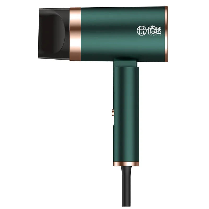 Foldable negative ion hair dryer in emerald green with folded handle and single nozzle