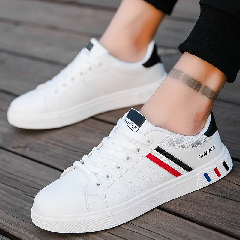 Sports shoes in black, grey, or white with mesh upper and cushioned sole
