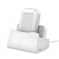 White headphone charging base station with fashion last design on flat surface