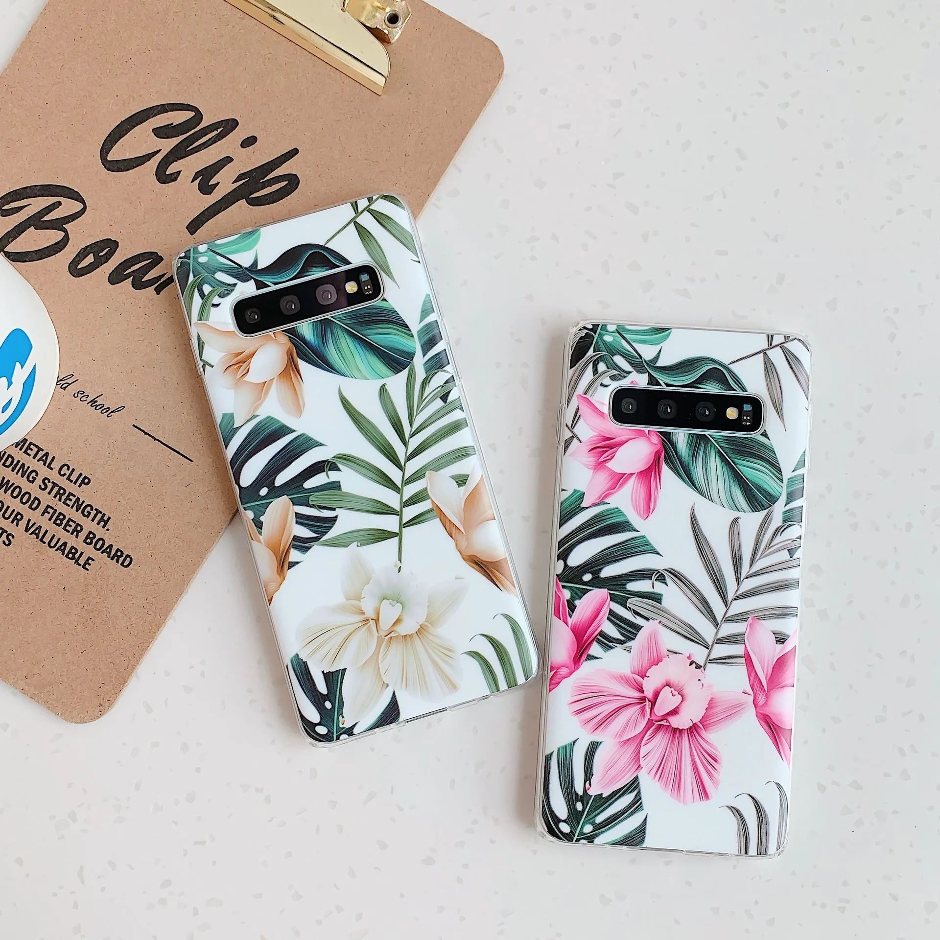 Slim green leaf floral TPU back cover case for Samsung Galaxy phone on a white background.