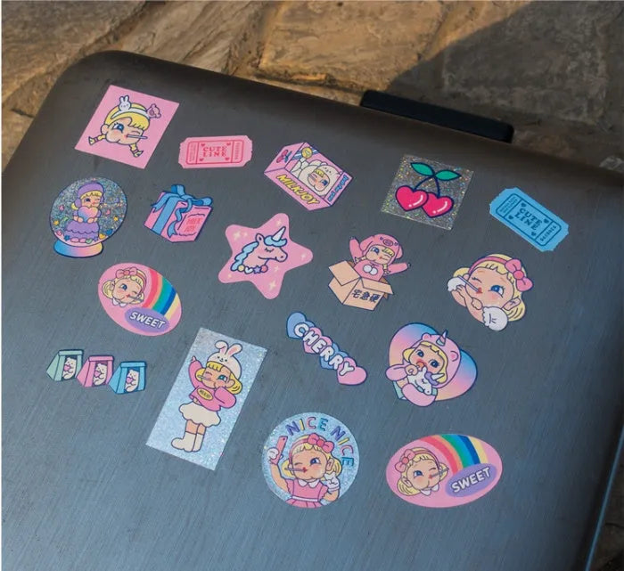 Set of 16 square Korean-style cute cartoon PVC stickers inside a transparent storage box.
