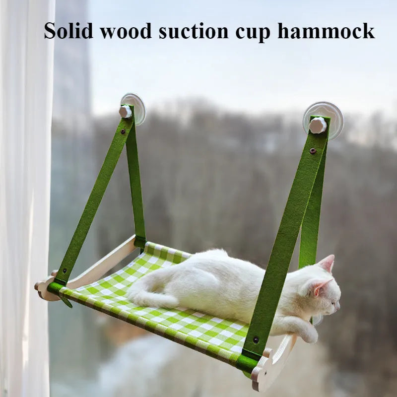 Wooden cat window hammock bed with suction cups mounted on glass, linen mat in green colour