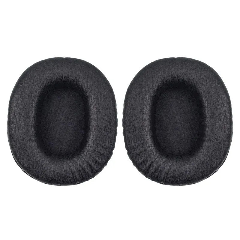 Black soft PU leather headphone covers for Sony 1R, shown on headphones in a home setting.
