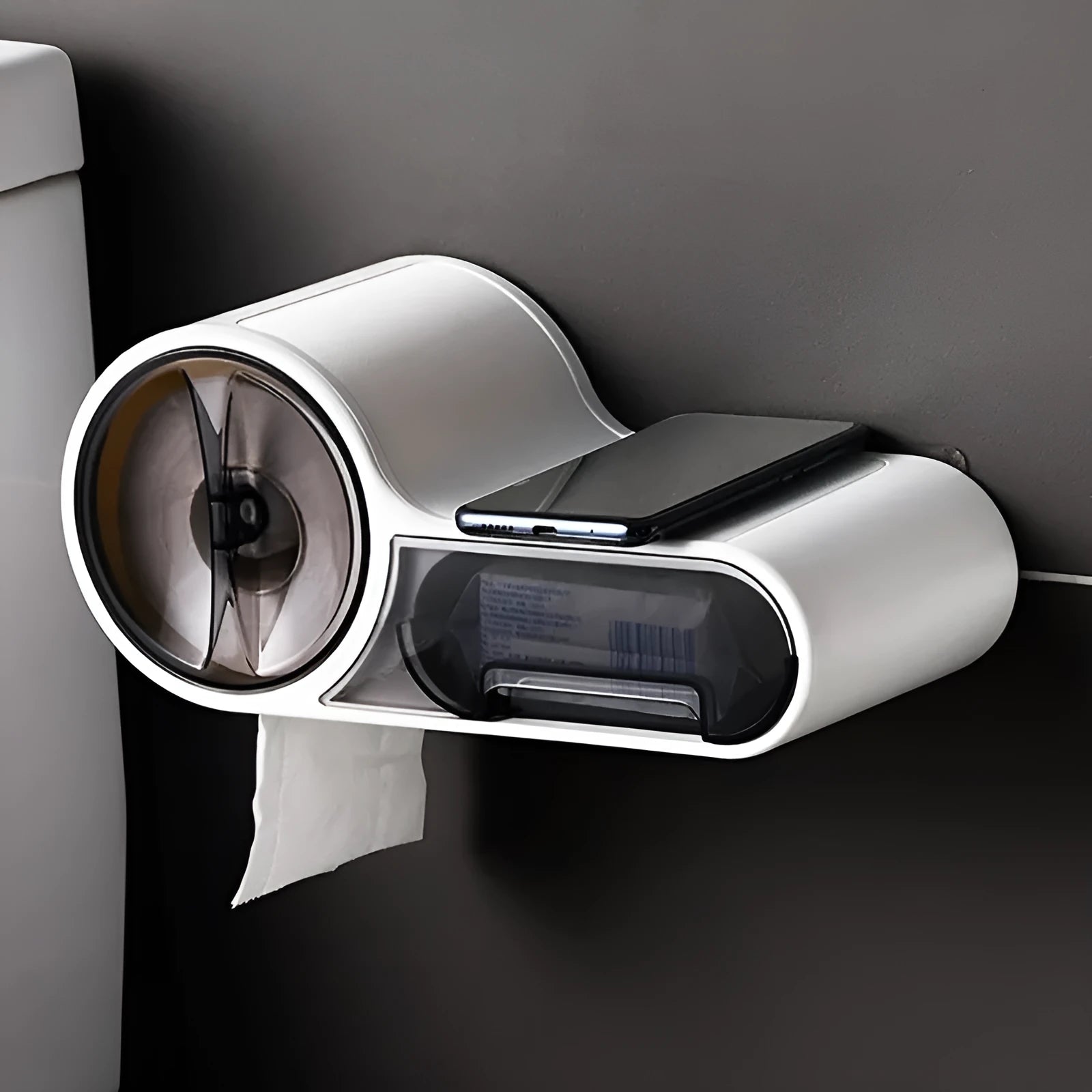 White plastic free-standing toilet roll holder with a curved design on a bathroom surface.