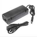 Black XBOX 360E AC power adapter with cable, compatible with multi-region consoles.
