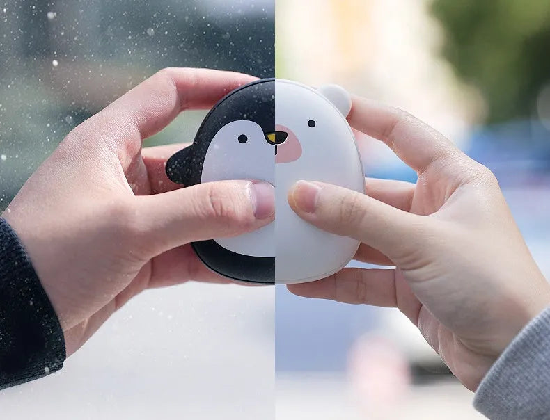 Cartoon penguin polar bear design USB hand warmer showing double-side heating and compact 83x78x35mm dimensions