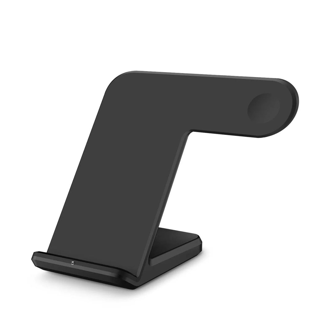 Black wireless phone charger with silicone surface measuring 140mm long on wooden desk
