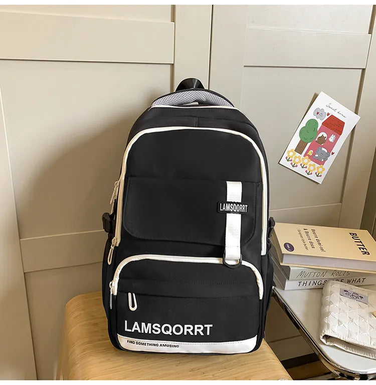 Waterproof nylon school backpack with curved shoulder straps in various colours with pendant options