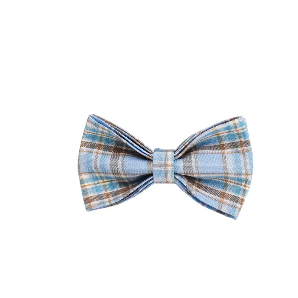 Sky blue and white grid pattern dog collar, leash, bow, and vest four-piece pet accessory set.