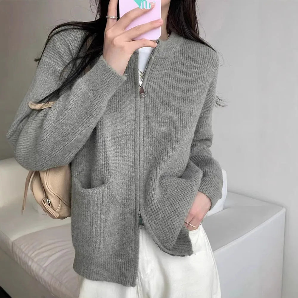 Beige viscose sweater coat cardigan with long sleeves showing soft texture and cardigan style