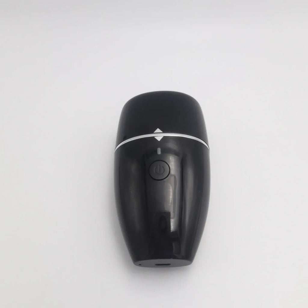 Black electric lip plumper with silicone nozzle and USB cable