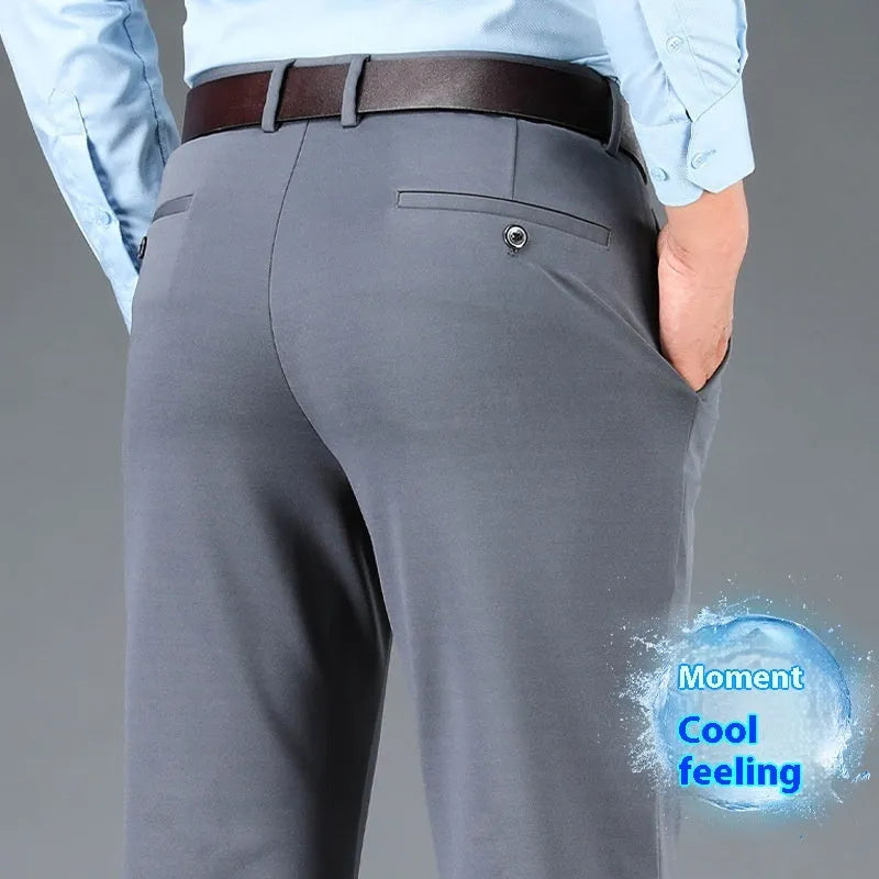 Men's straight-leg suit pants in dark blue with an elastic waistband, shown in a plus-size fit.