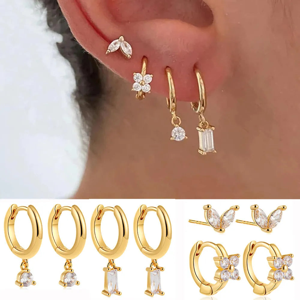 Copper geometric earrings set with electroplated gold finish showing star, ellipse, ring, and quadrilateral designs