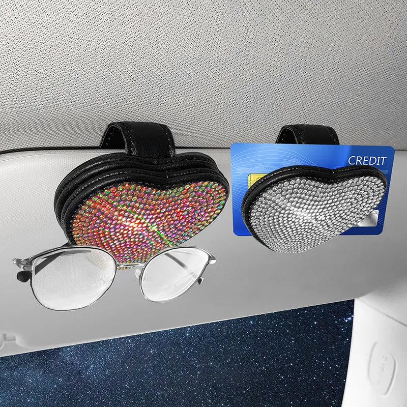 Magnetic car sun visor clip with diamond accents holding sunglasses, measuring 8.0 by 7.3 cm