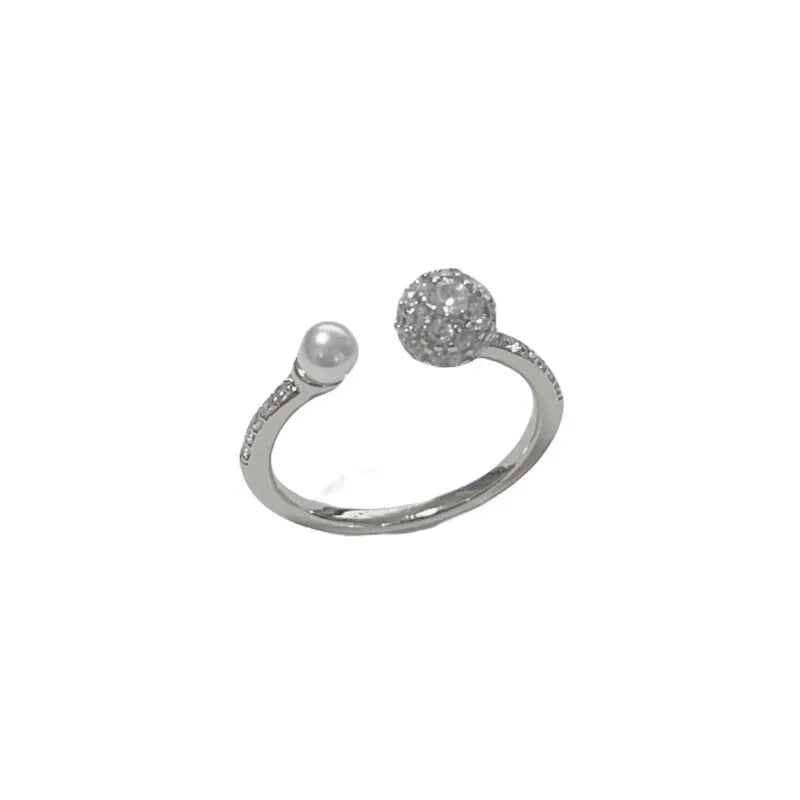 Open-end women's ring with round zircon stones and geometric design in gold plating
