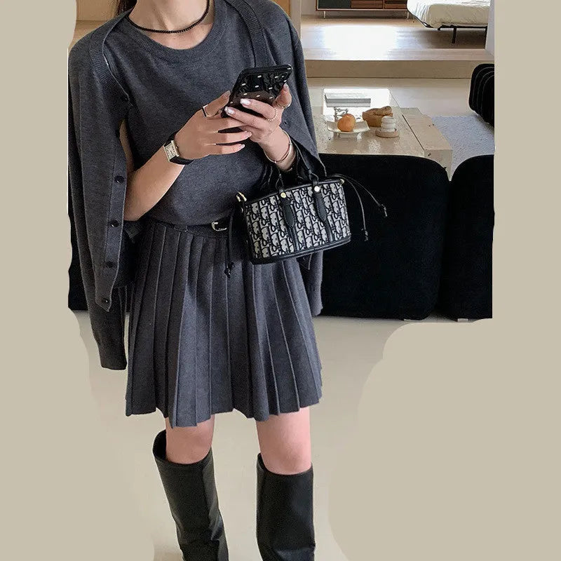 Women's national style knitted two-piece with vest skirt and cardigan featuring 3D pattern texture and adjustable belt