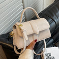 Women's beige messenger bag with 22cm width showing file compartment and exterior pocket
