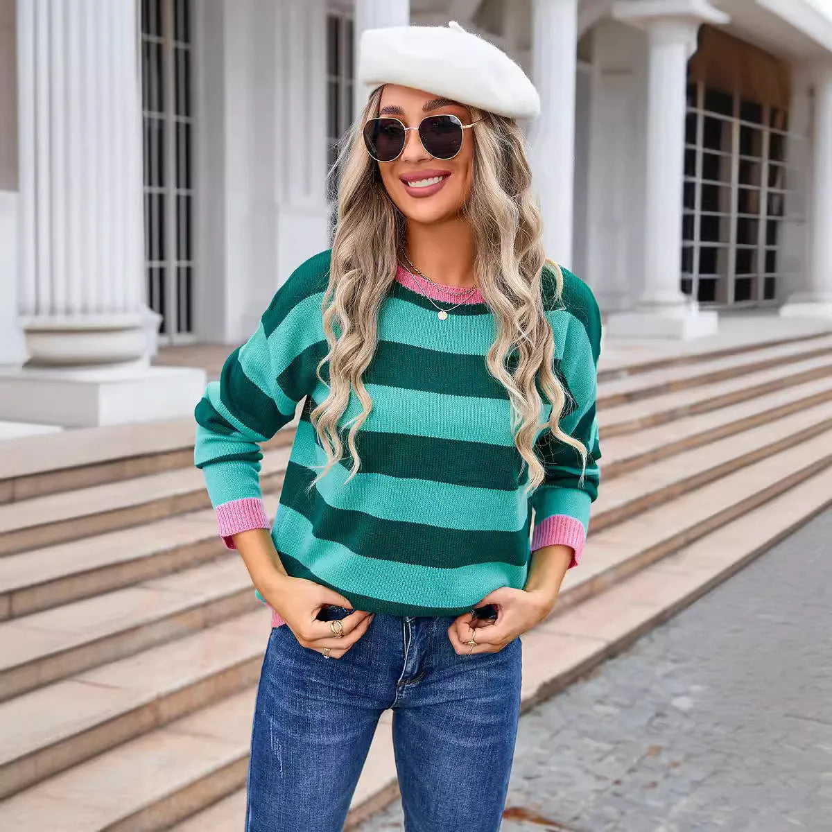 Women's loose-fit long sleeve acrylic sweater with round neck in striped or plaid pattern