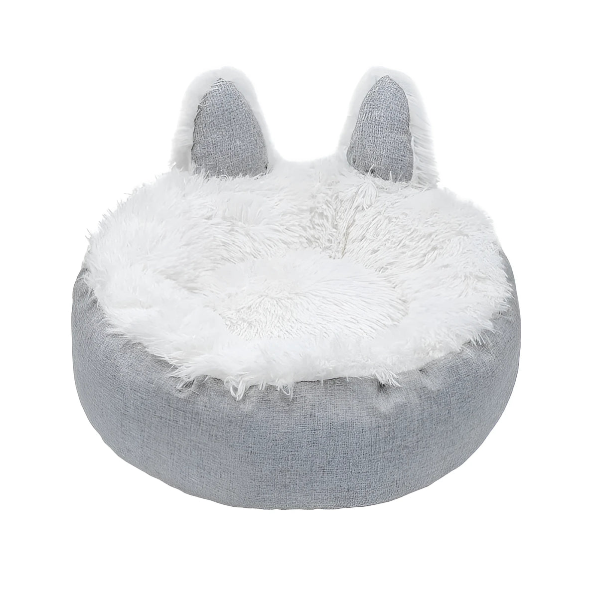 A round soft grey faux fur plush pet bed for cats or small dogs on a wooden floor.
