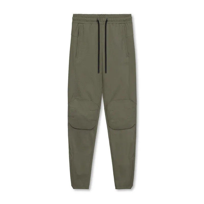 Men's grey fitness trousers with ankle-tied design, quick-drying polyester fabric for exercise