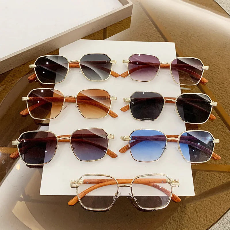 Frameless women's glasses with wood grain trim showing gold frame and double colour lens options