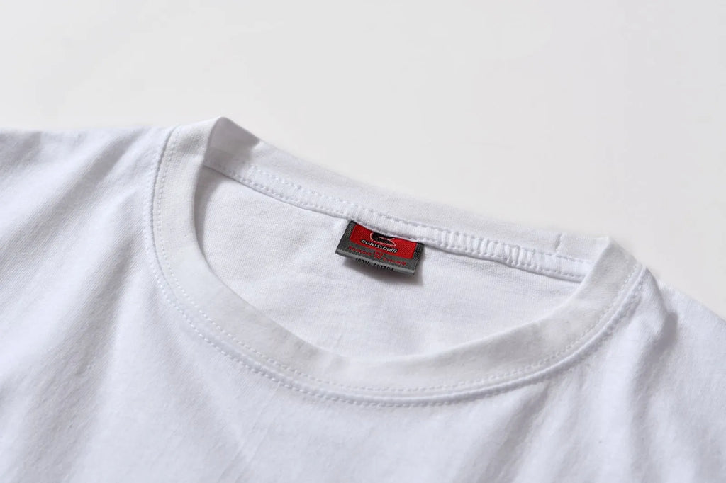 White cotton t-shirt overalls with round neck and short sleeves in patterned design