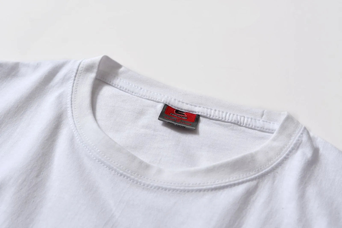 White cotton t-shirt overalls with round neck and short sleeves in patterned design