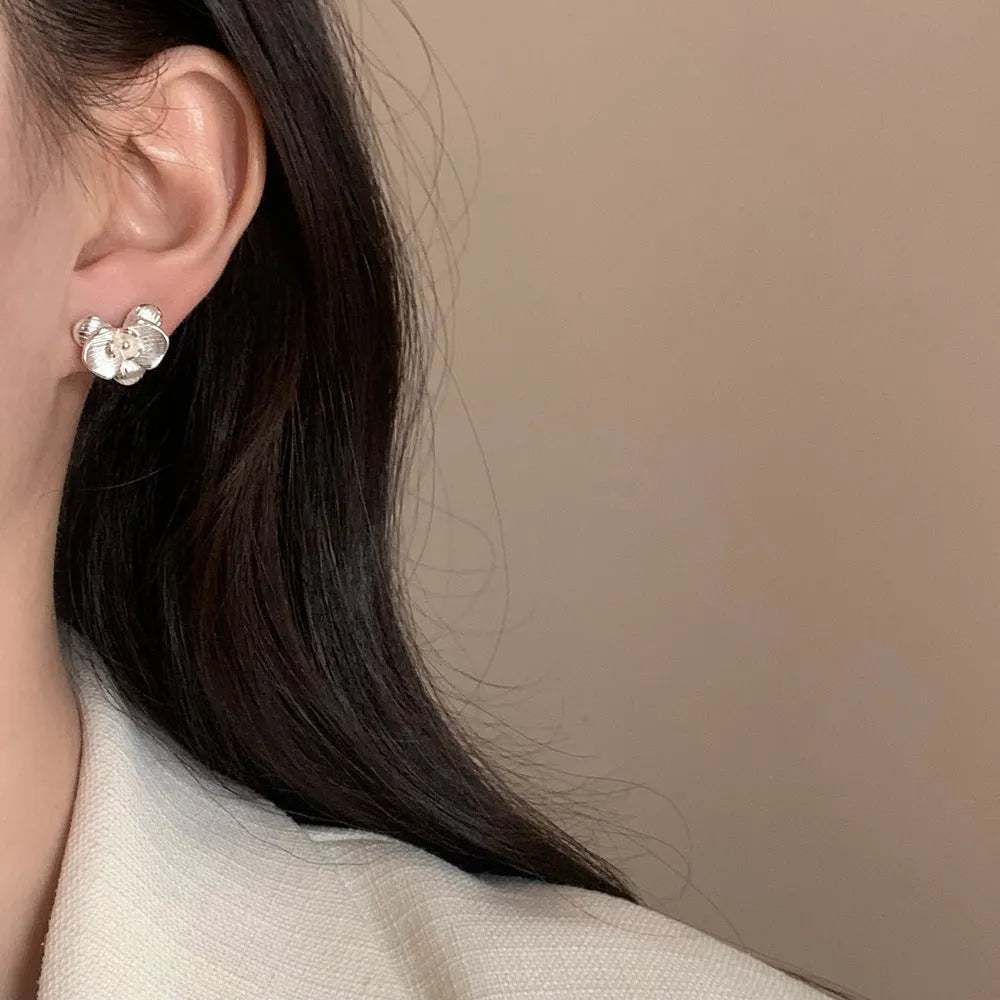 Copper flower earrings with petal design in gold or silver electroplated finish