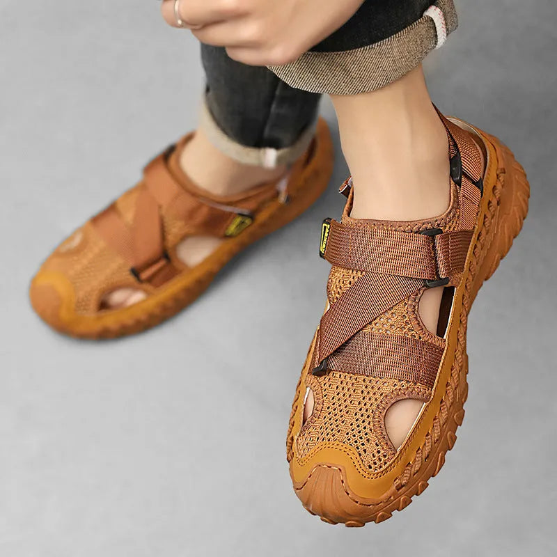 Men's casual sandals with hollow mesh surface and genuine leather upper in grey colour