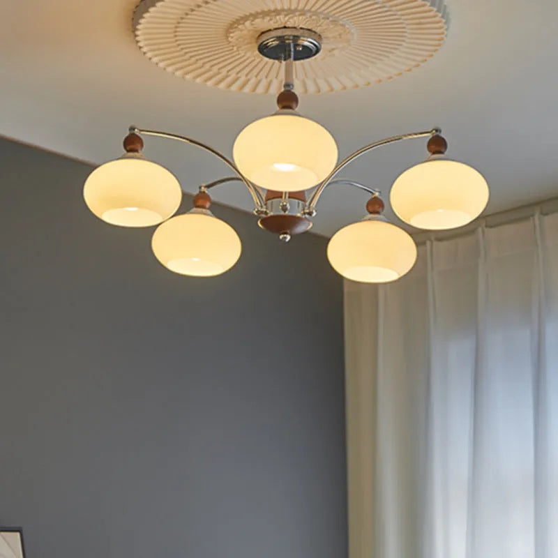 Persimmon glass chandelier with chrome and white lampshades in a middle ancient style