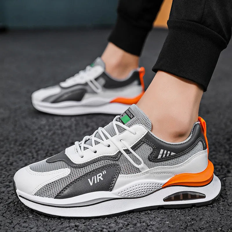 Men's gray breathable mesh running shoes with EVA sole and sewing thread details on upper