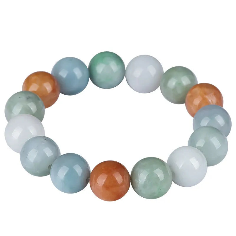Women's Myanmar jade bracelet with 13mm round beads showing three natural jade colours