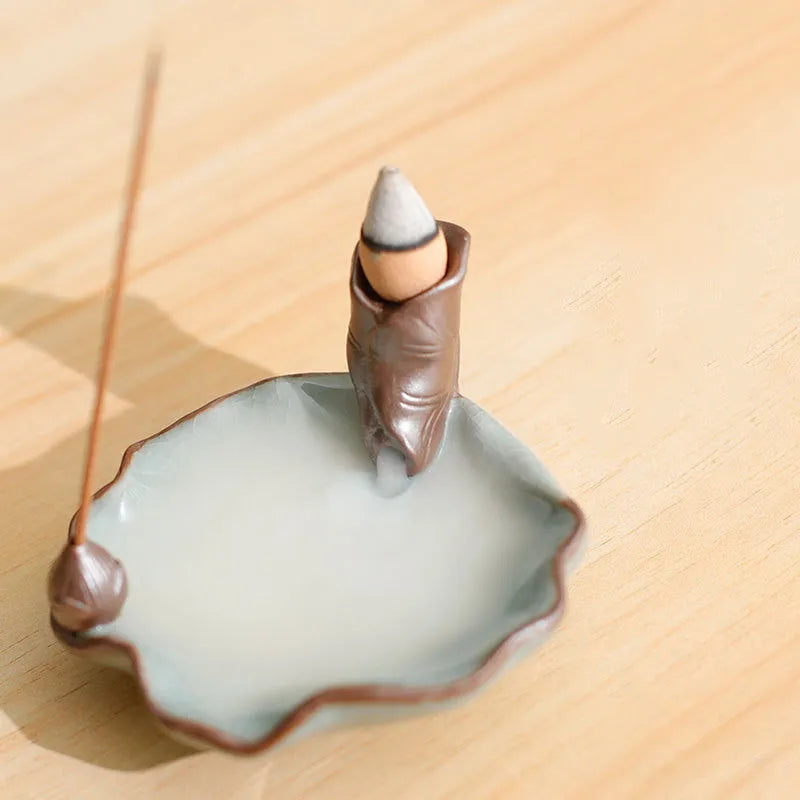 Square ceramic incense burner with Ge kiln crackle glaze showing lotus and plum blossom designs