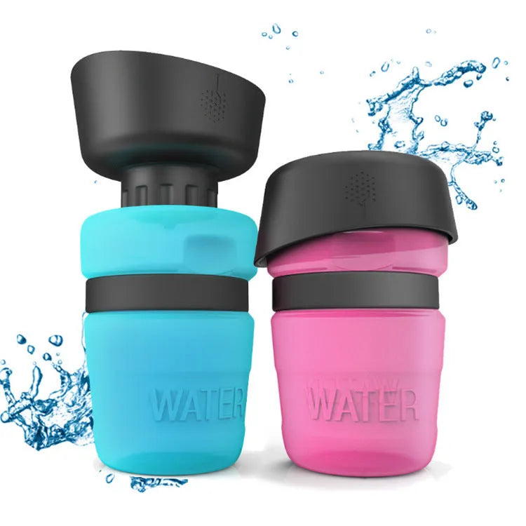 Blue portable dog water bottle with fold-out drinking cup, 520ml capacity.