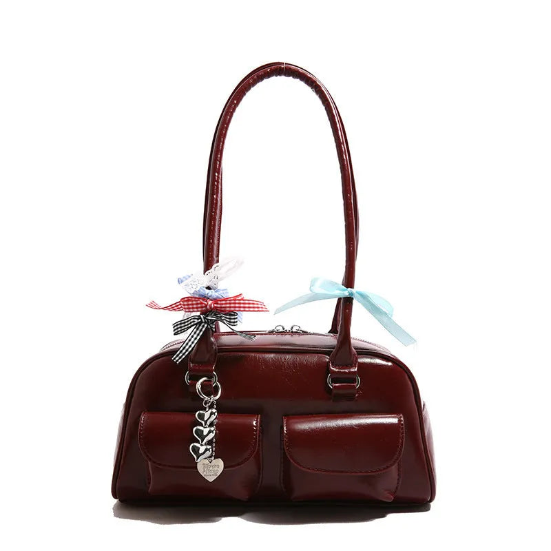 Retro pillow-shaped women's PU handbag in black with double shoulder strap and flap closure
