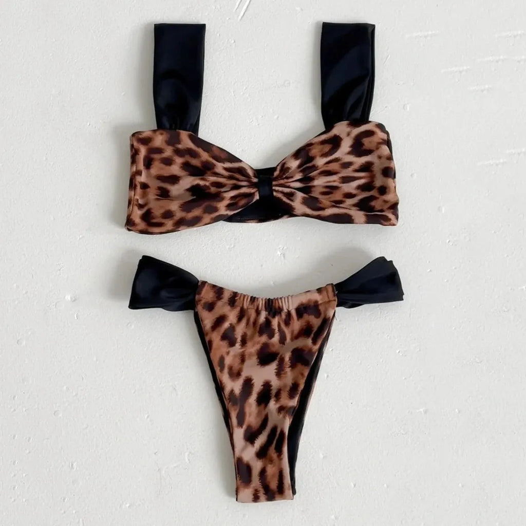 Women's leopard print bikini set with black split tube top and matching bottoms