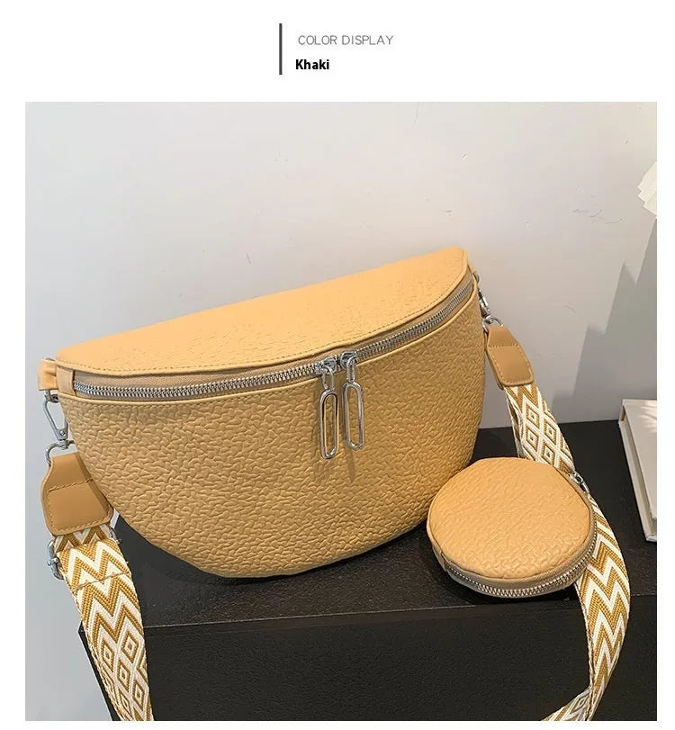 Women's solid colour crossbody bag with saddle lock zipper in horizontal square shape