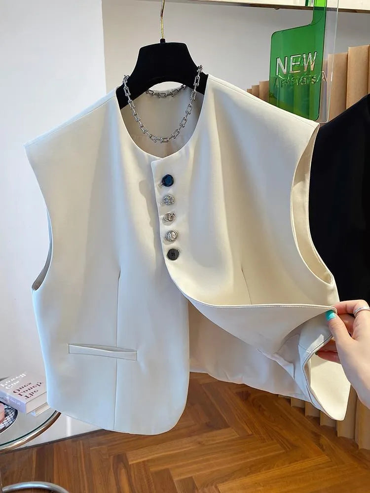 Beige loose-fitting waistcoat dress with side pockets, 40cm length, shown on mannequin