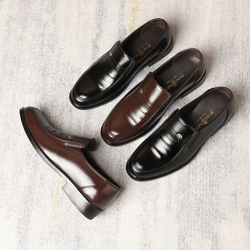 Men's black plus size casual shoe with a leather toe holder and rubber sole, shown from the side.