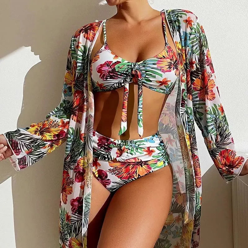 Women's long blouse style plus size bikini swimsuit in loose leisure fit on hanger.