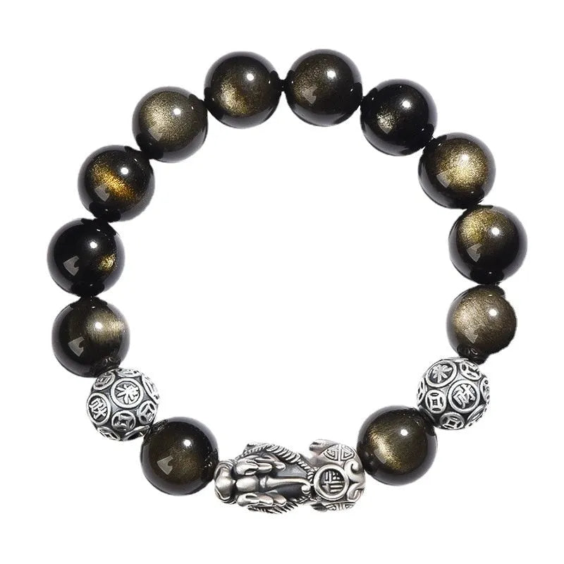 Men's geometric obsidian bracelet in sterling silver showing polished finish and natural stone detailing