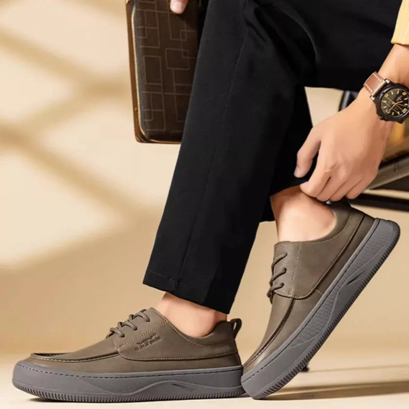 Brown retro leather casual shoes with big toe design and visible stitching on a rubber sole.
