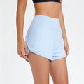 Women's black nylon fitness shorts with high-waist design for summer sports
