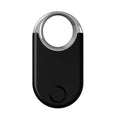 Black and white GPS anti-loss device for tracking pets and children, showing compact size and USB port