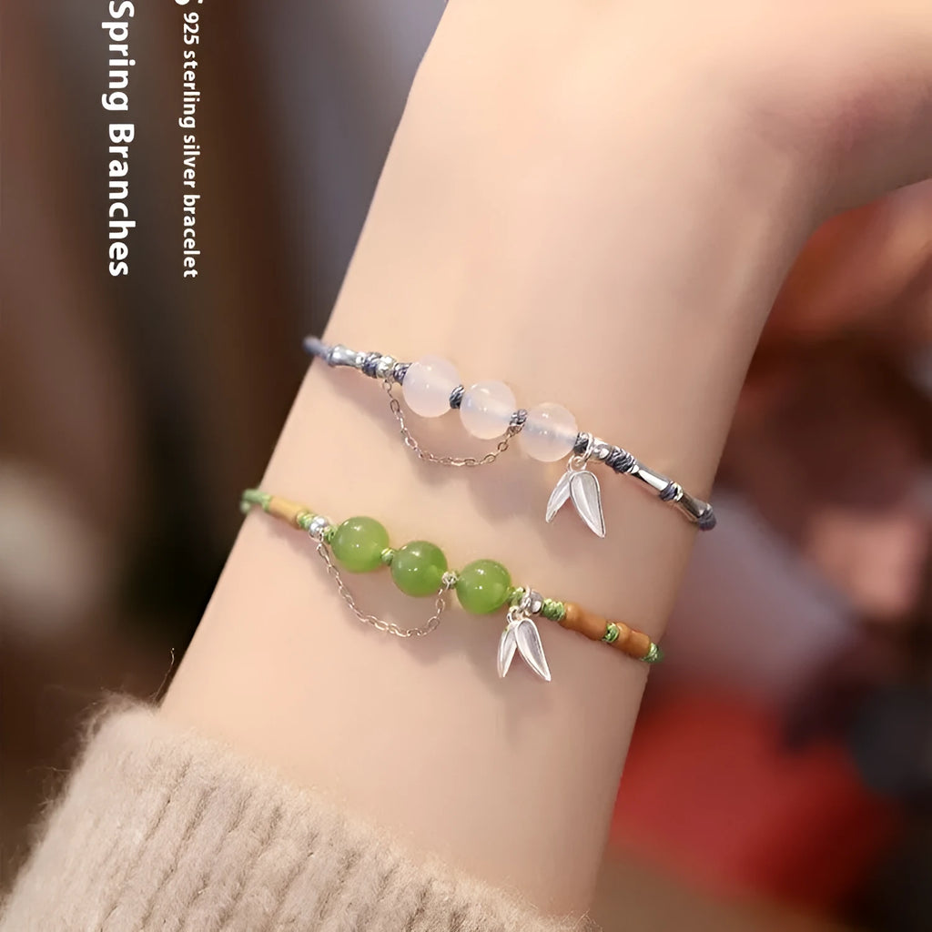 Women's Hetian jade bracelet with woven strap, diamond beads, and lotus seedpod charm in light green or haze blue