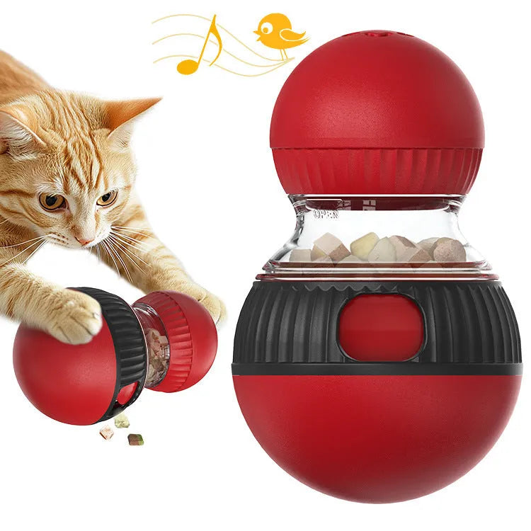 Rotating plastic cat toy with sound features and food dispensing opening, measuring 155mm length
