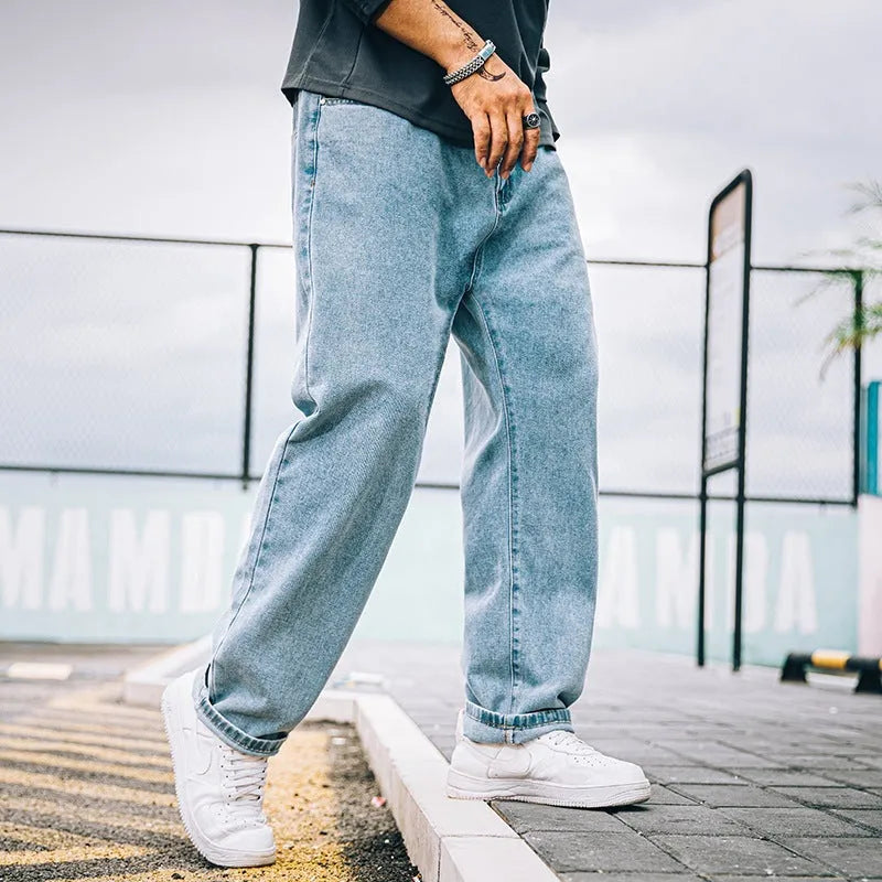 Men's loose straight jeans in dark blue cotton with mid-waist fit and straight leg cut