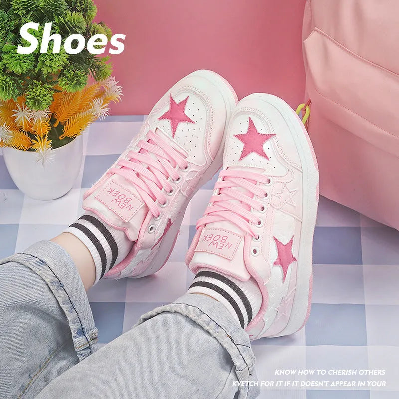 Pair of denim couple skateboard shoes with round toe, flat rubber sole, and mesh lining in black colour.