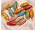 Ceramic jewellery making beads in eight colours including pink, yellow, blue, red, coffee, green, orange and mixed